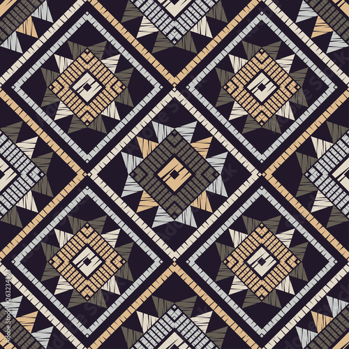 Ethnic boho seamless pattern. Embroidery on fabric. Patchwork texture. Weaving. Traditional ornament. Tribal pattern. Folk motif. Can be used for wallpaper, textile, invitation card, wrapping, web pag