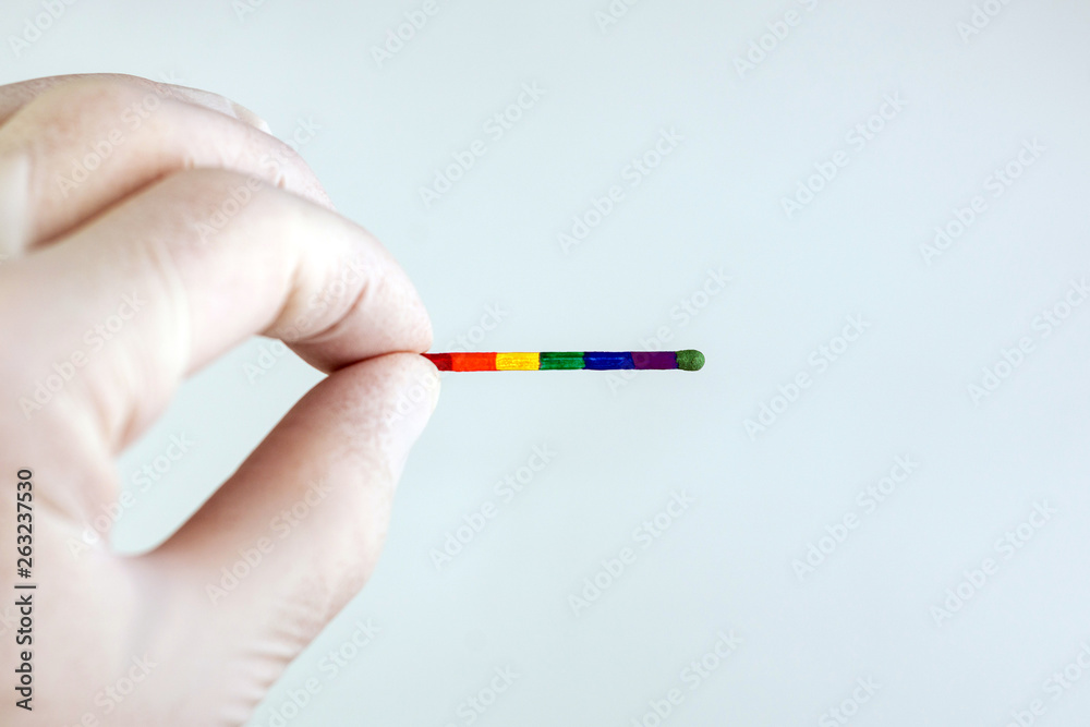 homosexuality concept: an unusual match of rainbow-colored LGBT symbolism homosexuality concept: an unusual match of rainbow-colored LGBT symbolism