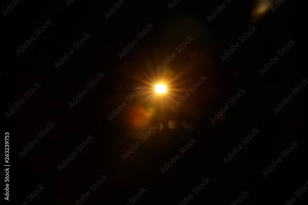 Abstract Natural Sun flare on the black background. Abstract Natural Sun flare on the black background.