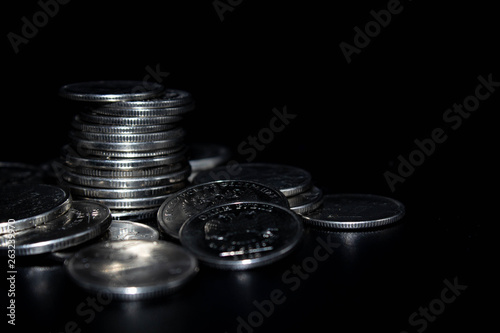 Wallpaper Mural Coins stack on black background in concept wall and strong money. Torontodigital.ca