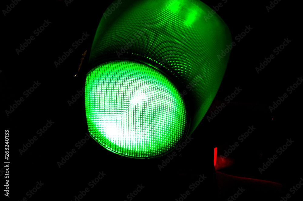 Green light of traffic light on the crossing. Road crossing permit, signal to go. Green light of traffic light on the crossing. Road crossing permit, signal to go.
