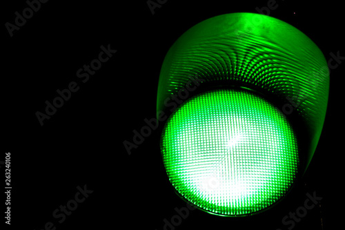 Green light of traffic light on the crossing. Road crossing permit, signal to go.
