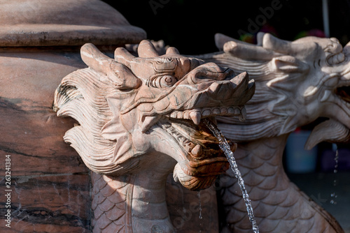 Chinese dragon head, water fountain, close up