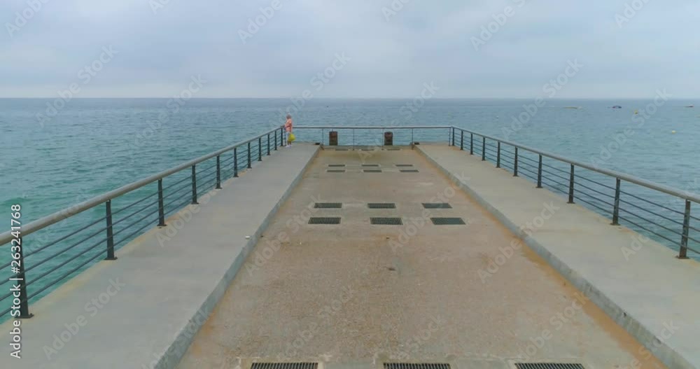 Aerial view of Praia dos Pescadores pier (Fishermen beach) in a cloudy day, famous destination in Albufeira, Algarve, Portugal. Aerial view of Praia dos Pescadores pier (Fishermen beach) in a cloudy day, famous destination in Albufeira, Algarve, Portugal.