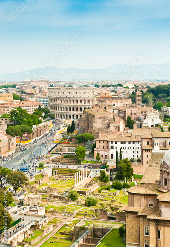 Beautiful aerial view. Colosseum in sunny spring day. Rome. Italy
