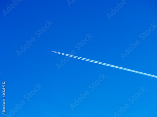 Jet airplane in the clear sky background