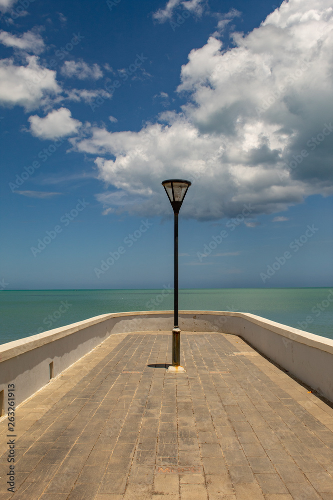 Street light with amazing caribbran sea in the background, in the Miches Promenade (Dominican Republic).