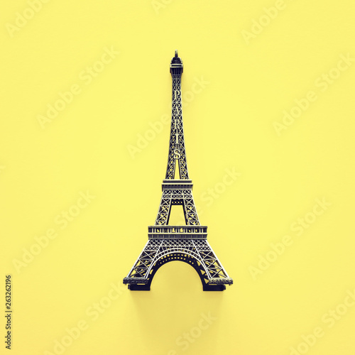 Paris symbol Eiffel Tower over yellow background
