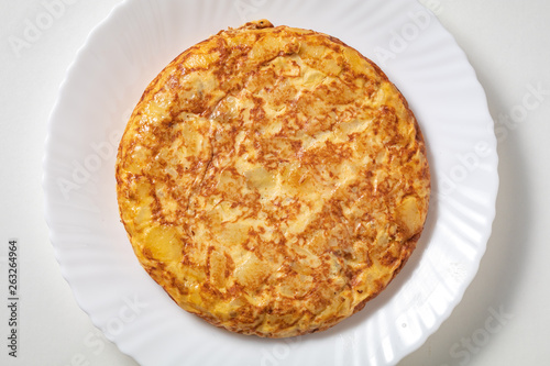 Spanish omelette on white plate © DMegias