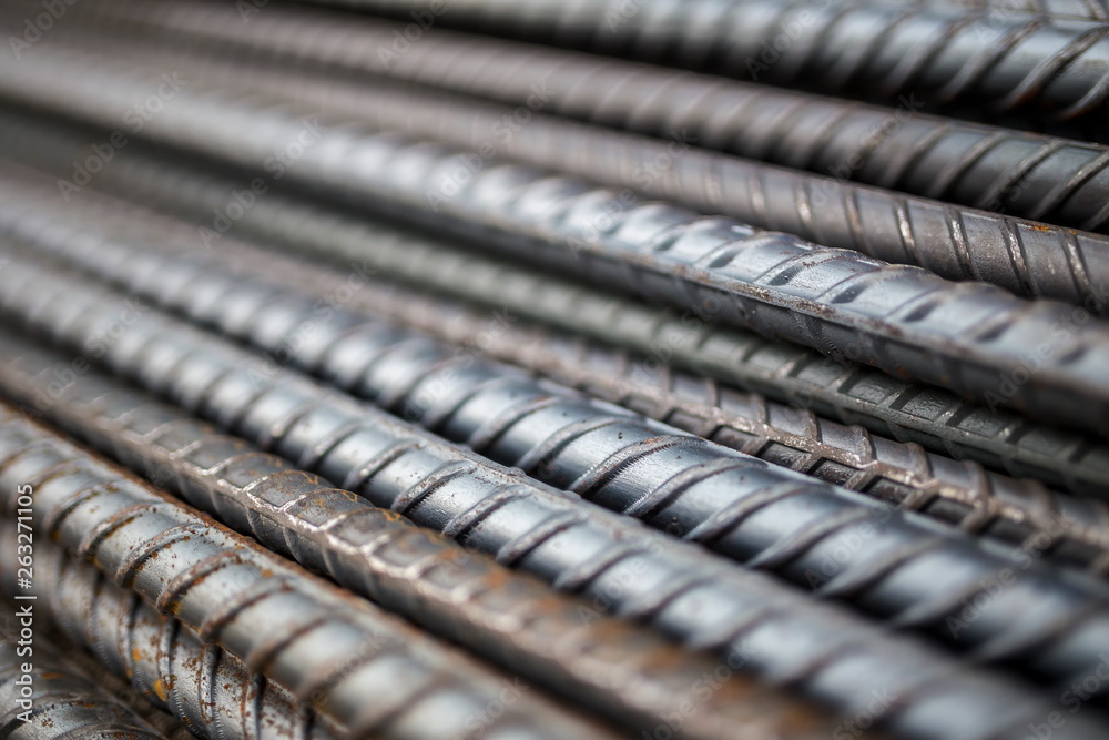 Stack of steel bar texture in construction site for background.