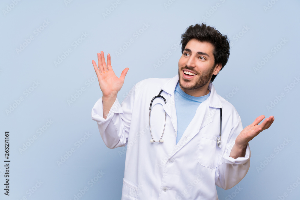 Doctor man with surprise facial expression