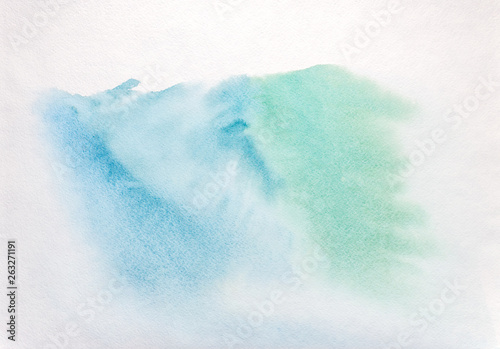 hand painted watercolor wash background in blue and green colors