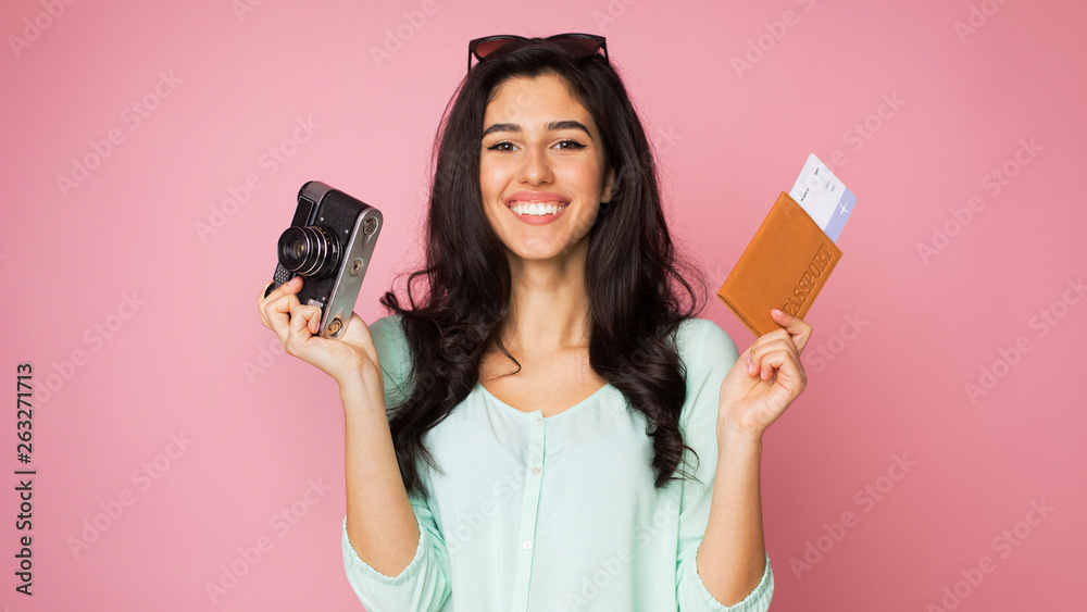 Wait for vacation. Girl with retro camera and tickets - obrazy, fototapety, plakaty 