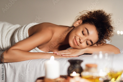 Spa and wellness. Woman relaxing with aroma composition