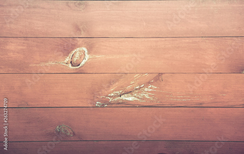 Horizontal wooden Board brown with bitches on the surface .Texture.Background. photo