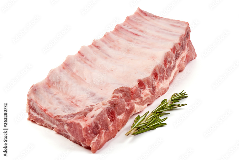 Fresh raw pork ribs, close-up, isolated on white background