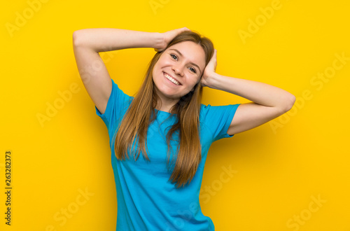 Young woman with blue shirt laughing