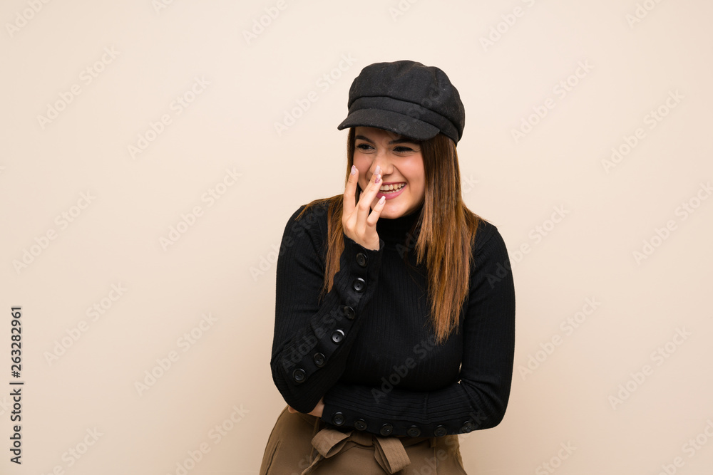 Fashion woman with hat smiling a lot