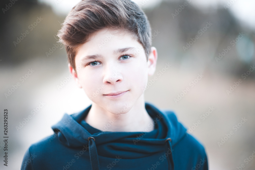 14 year old boy with brown hair and blue eyes