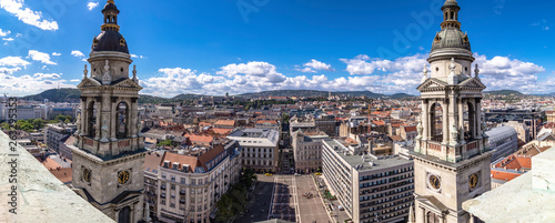 Panoramic view (Version 2) from the vantage point located in the dome of St. Stephen's Cathedral, overlooking the cathedral square with the two bell towers, in Budapest, Hungary.