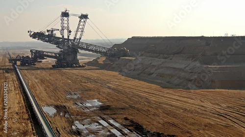Bucket-wheel excavator in open-cast mining pit in Germany