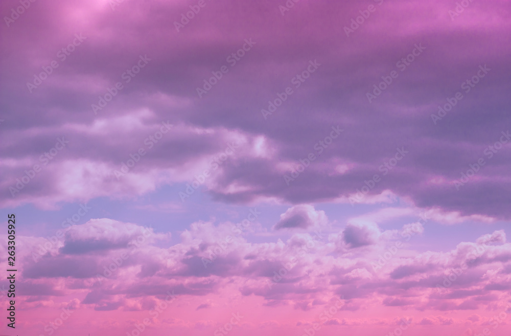 Colorful dramatic lilac sky and ultra violet clouds - nature background with space for copy.