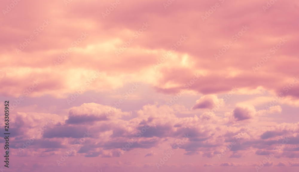 Fototapeta premium Colorful dramatic lilac sky and ultra violet clouds - nature background with space for copy.