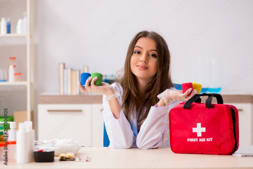Female beautiful doctor with first aid bag Female beautiful doctor with first aid bag