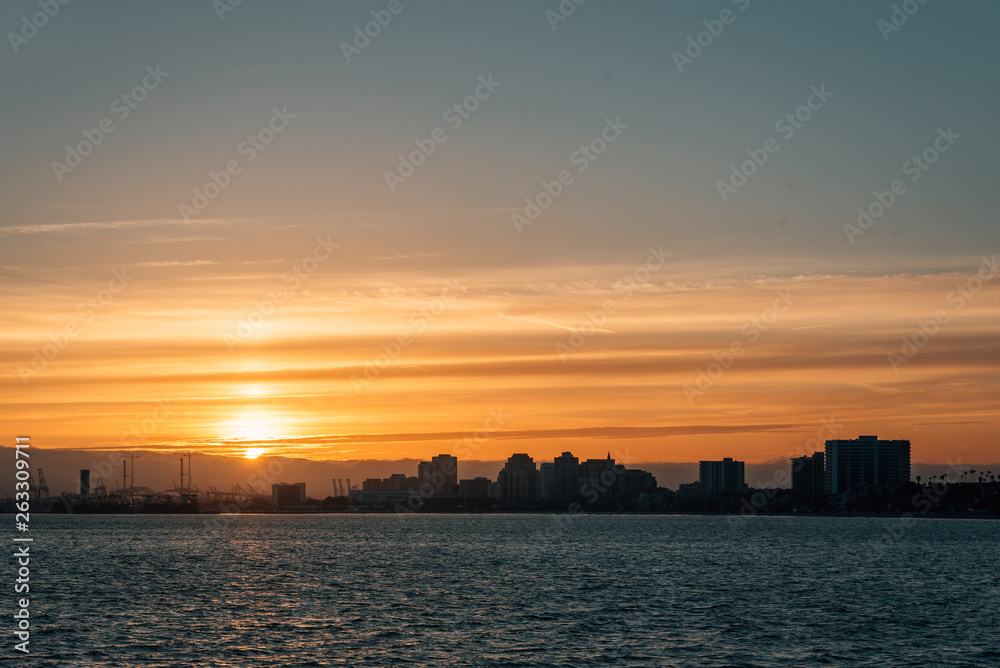 Sunset view over the Long Beach skyline from the Belmont Pier in Long Beach, California