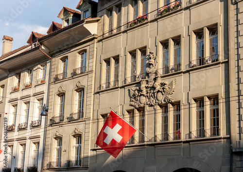 Switzerland flag hanging on building in Bern