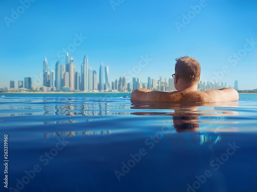 Photography portrait of relaxed european caucasian redhead man with hair back in glasses in
