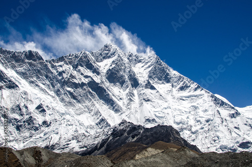Front view of south face wall of Lhotze mountain in Nepal. Himalayas. 8516 meters above the sea. Covered by clouds. 