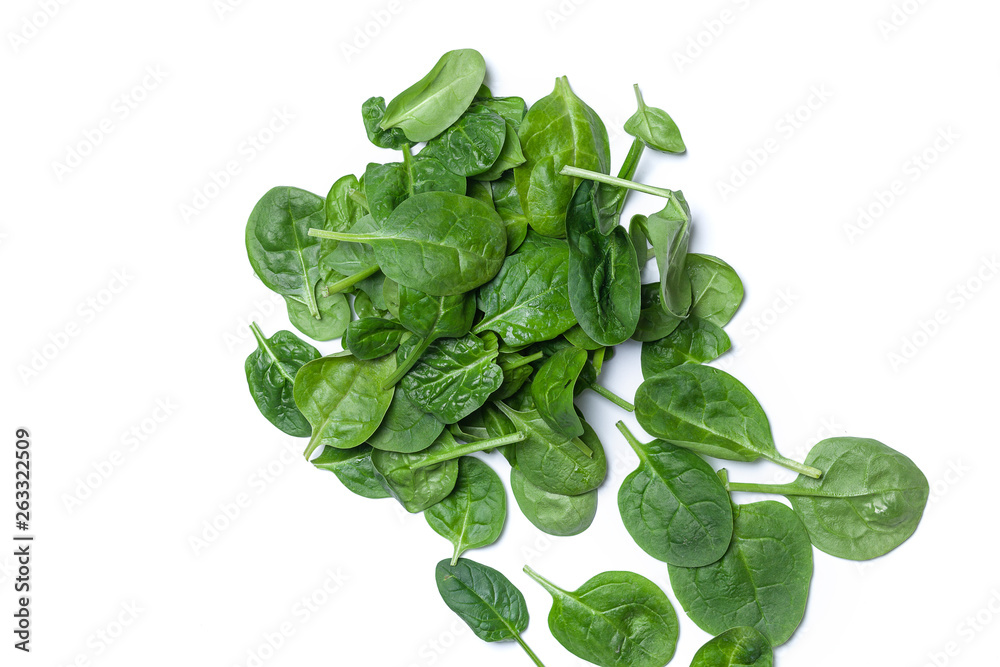 Fresh spinach leaves on white isolated background. The concept of healthy food and vegetarianism Fresh spinach leaves on white isolated background. The concept of healthy food and vegetarianism