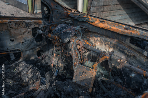 Interior of a completely burned car in the suburbs