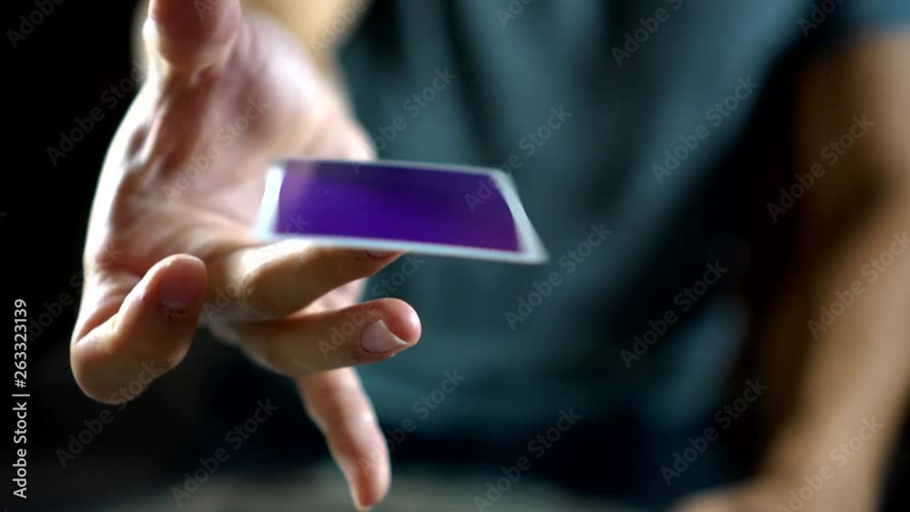 Spinning a playing card on one finger Spinning a playing card on one finger