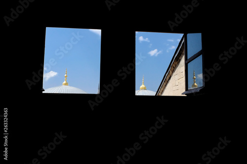 Mosque top domes view from a window © André Dias Duarte