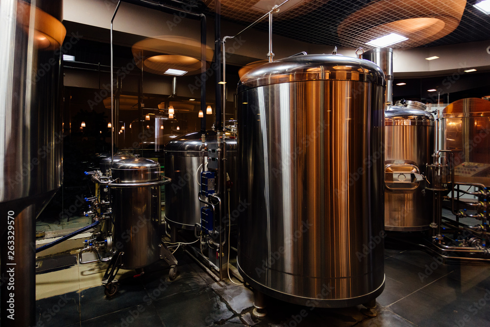 Fototapeta premium Craft beer production line in private microbrewery