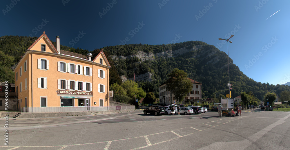 Naklejka premium Street scene in the Swiss village of Noiraigue, Romandie