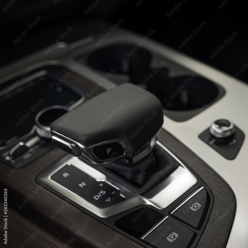 Automatic transmission in business car. Interior detail.