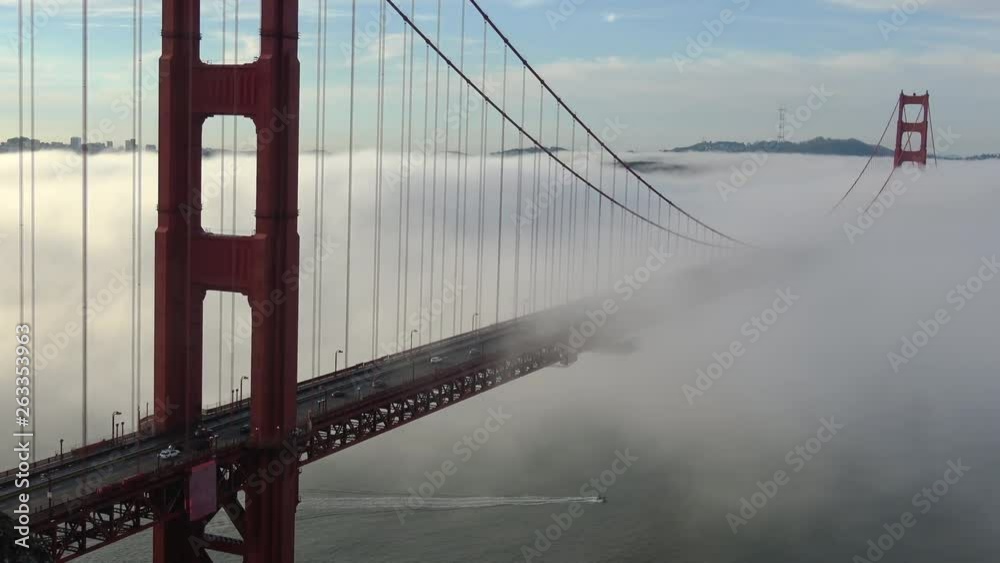 Cars Driving into Fog on Golden Gate Bridge to the Sound of the Fog Horn.