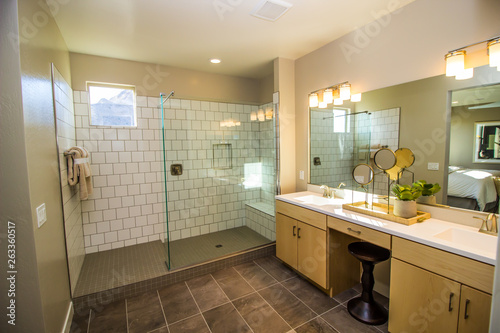 Fototapeta Naklejka Na Ścianę i Meble -  Modern Bathroom With Glass Walk In Shower