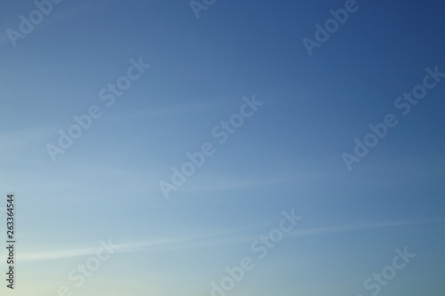 morning light on clear blue sky background