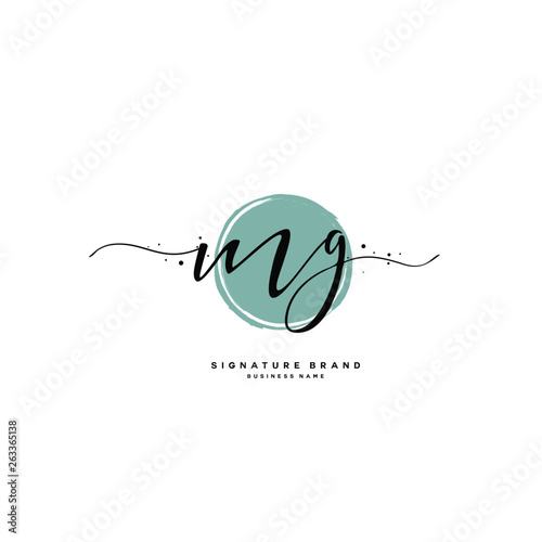 M G MG Initial letter handwriting and  signature logo. photo