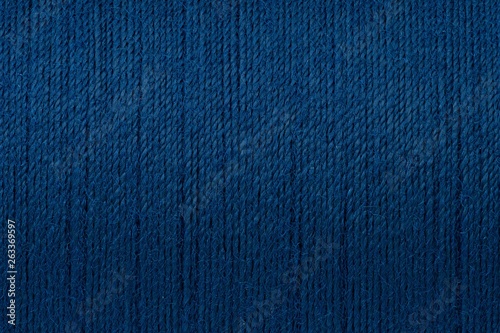 Macro picture of dark blue thread texture background