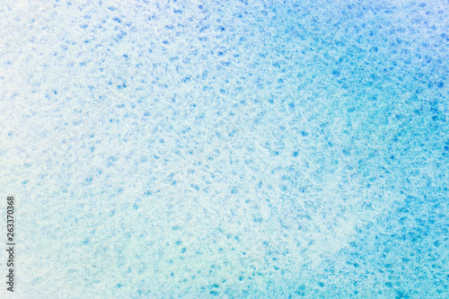 blue gradient fill on textured watercolor paper. macro