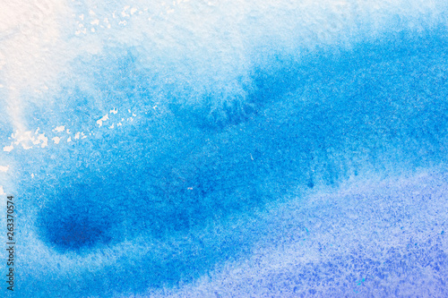 abstract hand painted colorful blue watercolor wet background on paper