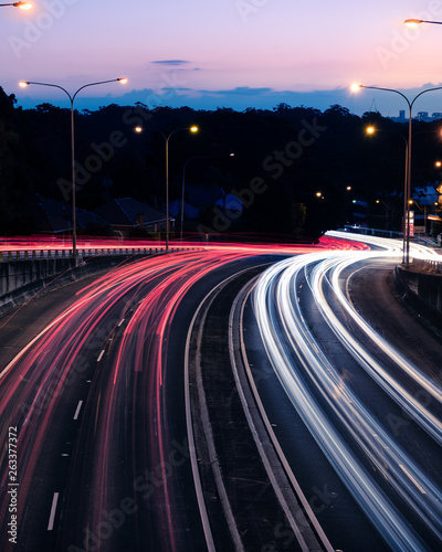 Photography Traffic light trails at dusk down Ryde Road, seen from the Pacific Highway Bridge at Pymble - portrait