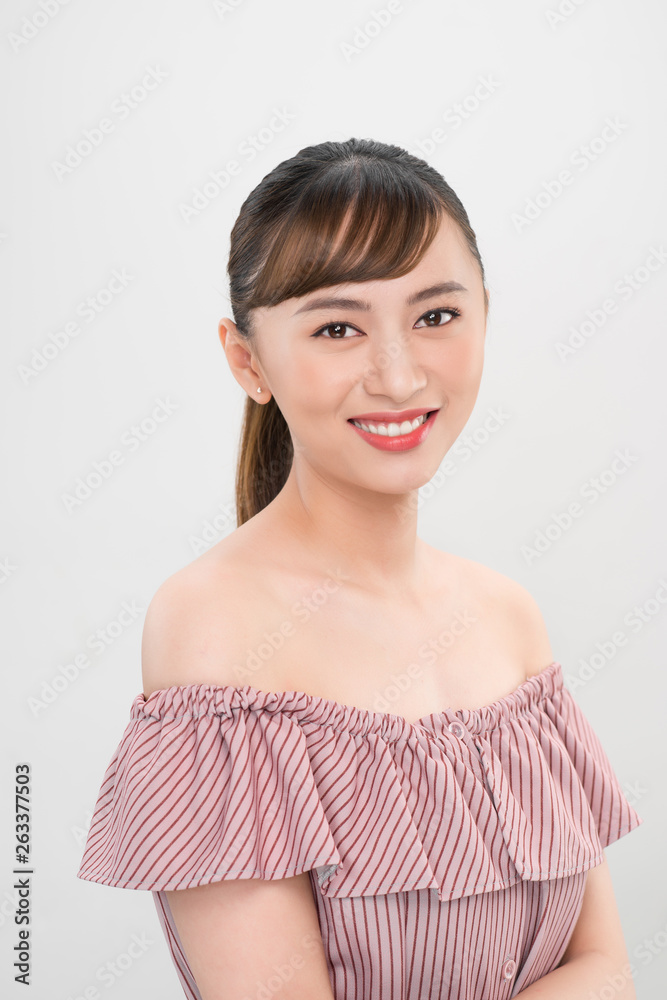 Pretty smiling joyfully asian teenager female dressed casually, looking with satisfaction at camera Pretty smiling joyfully asian teenager female dressed casually, looking with satisfaction at camera