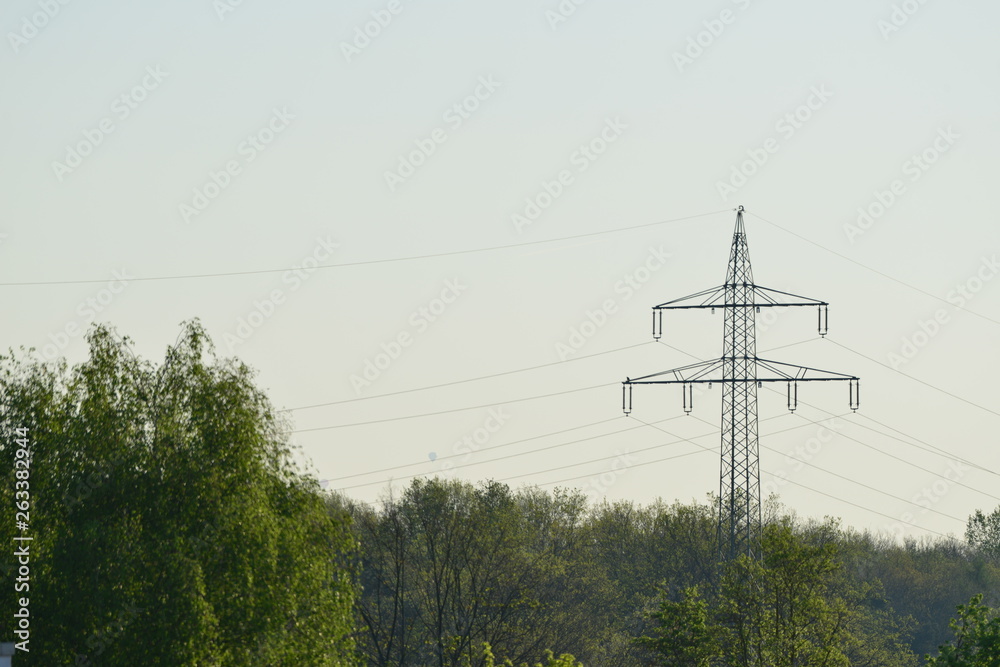 power pylons in germany on a sunny morning