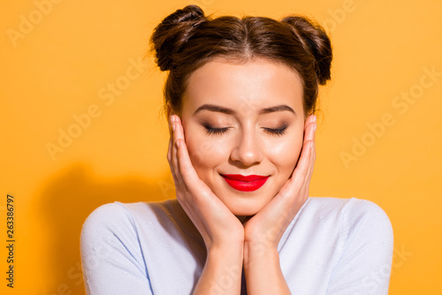 Close-up portrait of her she nice attractive lovely lovable winsome fascinating cheerful cheery girl closed eyes isolated on bright vivid shine yellow background